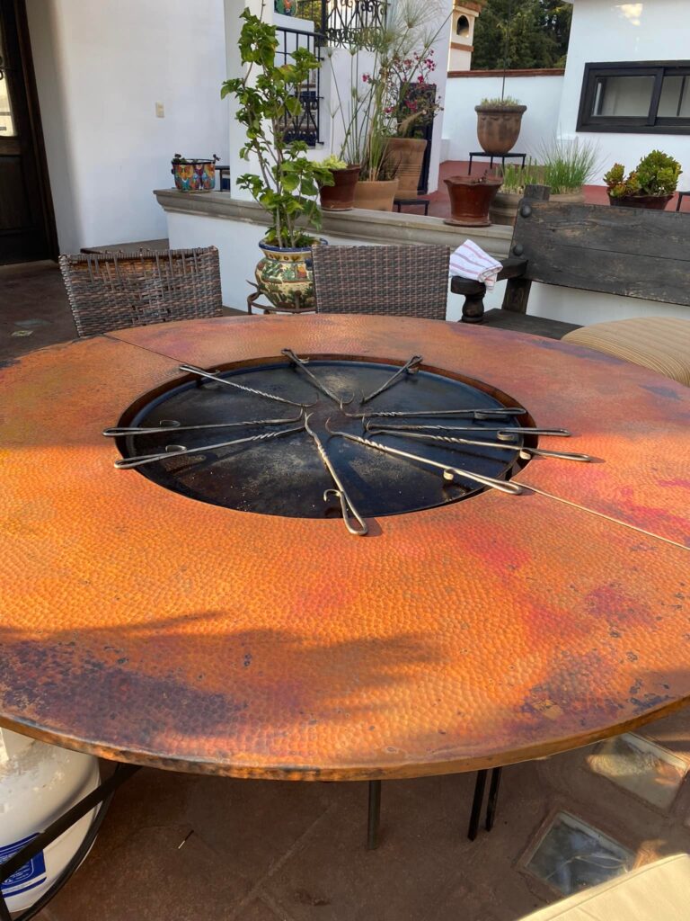 Mesa con parrilla para exteriores